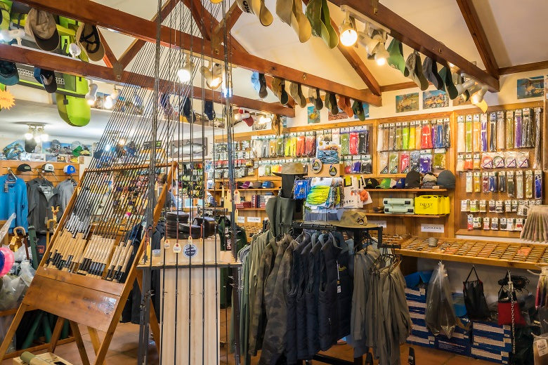 Inside the Mavungana Flyfishing Dullstroom shop showing our selection of tackle including rods, clothing, flies, fly tying material and more.