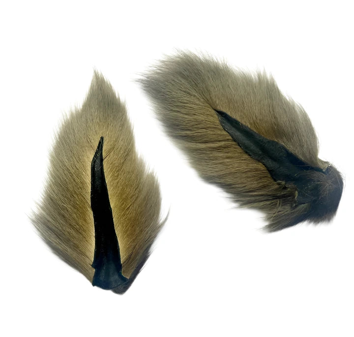 Midwest Premium Bucktails with dark roots, lying flat on a white background.