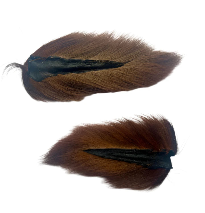 Midwest Premium Bucktails with dark roots, lying flat on a white background.