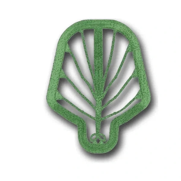 A green plastic or foam leaf-shaped cutout or stencil piece, shown on a plain white background with a soft drop shadow.